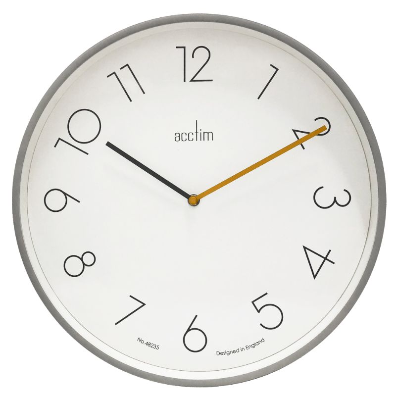 Large smoke grey wall clock with offset numbers and yellow second hand, perfect for modern home decor.