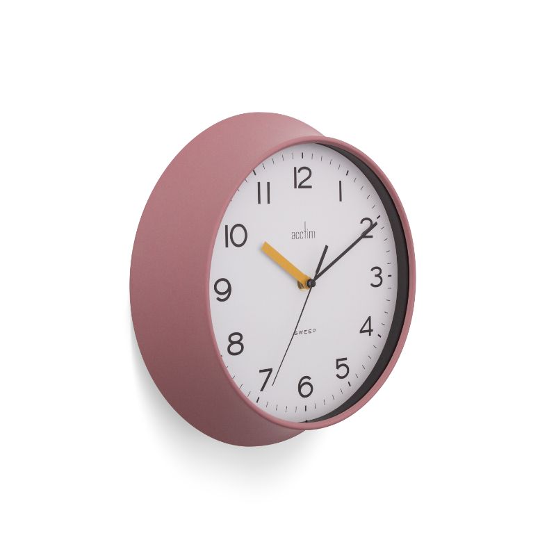 Dusty rose 29cm Acctim Rhea wall clock with bold, easy-to-read numbers and minimalist design for stylish decor.