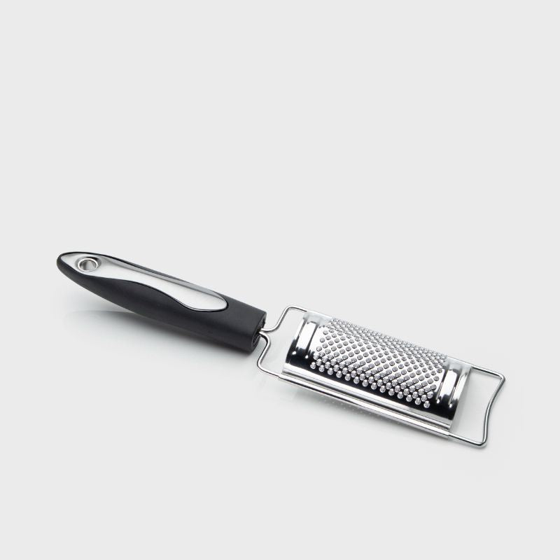 Versatile 14cm grater & zester for cheese, citrus, & chocolate; ergonomic design for comfort and ease of use.