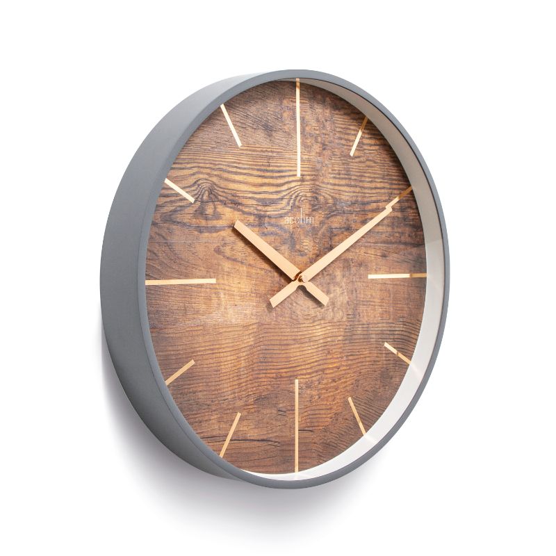 Accitim Hancock Wall Clock in Grey/Oak features a rustic dial, copper batons, and brushed metal hands, blending elegance with nostalgia.