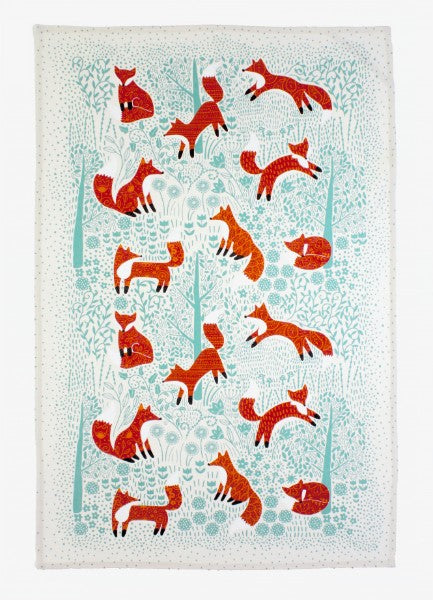 Whimsical cotton tea towel featuring a foraging fox on a duck egg shell background, ideal for functional kitchen use.