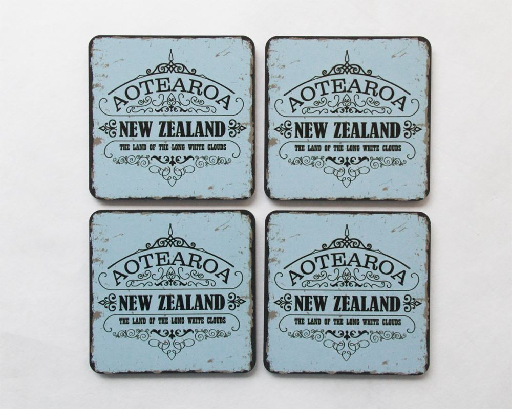 Set of 4 vibrant Kiwiana coasters featuring Aotearoa designs, made from durable MDF with cork bases, elegantly gift boxed.