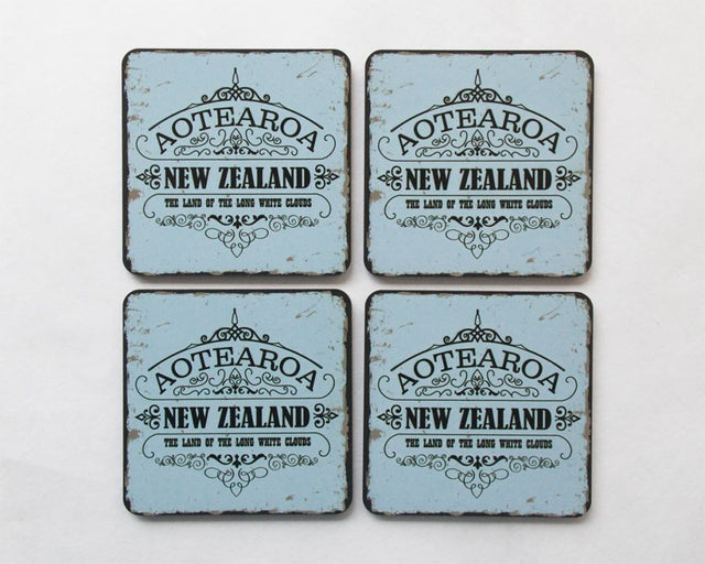 Set of 4 vibrant Kiwiana coasters featuring Aotearoa designs, made from durable MDF with cork bases, elegantly gift boxed.