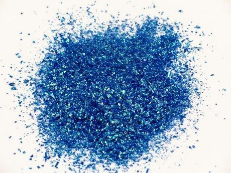 Vibrant blue confetti glitter in a 500ml jar, perfect for arts and crafts, adding sparkle to projects and decorations.