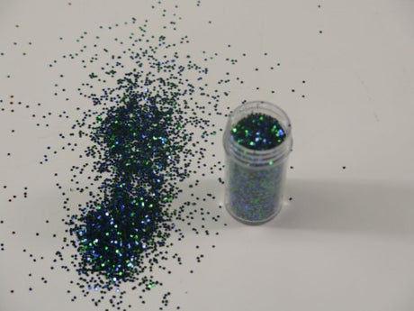 Vibrant peacock-colored glitter powder, perfect for crafting, enhancing projects with shimmer and eco-friendly formula.