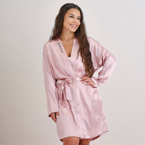 Pink satin bridesmaid dressing gown featuring 'bridesmaid' embroidery, one size fits most, 60cm width, 90cm length.