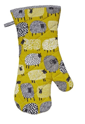 Ulster Weavers Gauntlet Dotty Sheep oven glove featuring quirky sheep design in mustard and grey, offering heat protection and style.