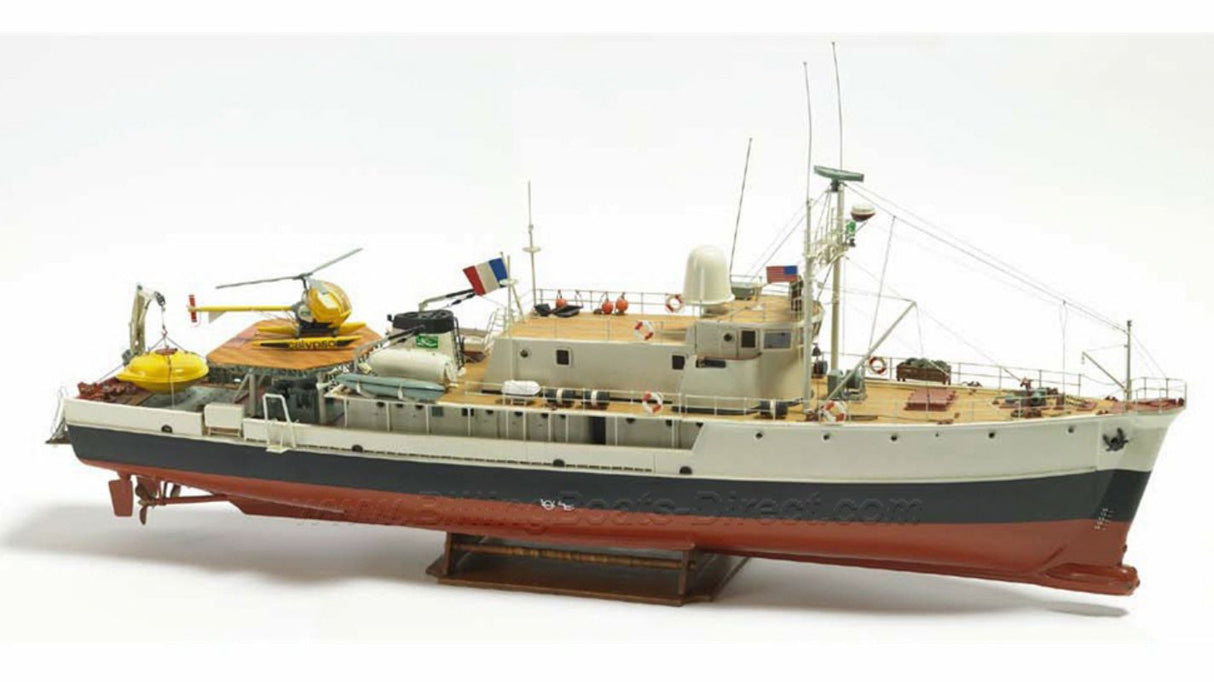 Detailed wooden model ship kit of the 1/45 Calypso, featuring iconic design and radio control capability.