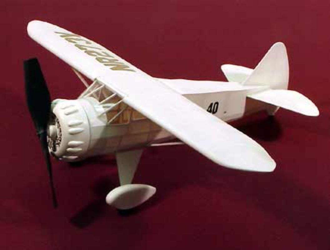 17 1/2" Mr. Mulligan balsa glider kit with laser-cut parts, propeller, and easy assembly instructions for model aviation enthusiasts.