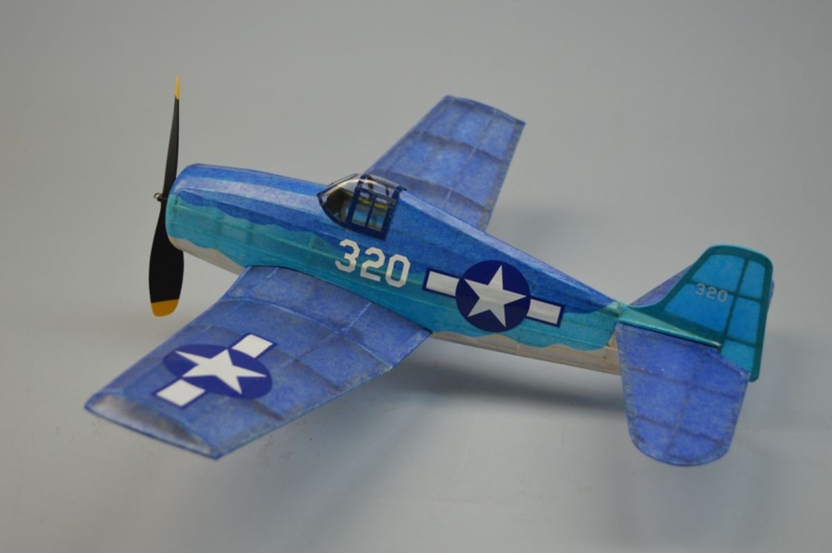 18-inch balsa glider model of the WWII F6F Hellcat with detailed decals and precision parts for easy assembly and flight.