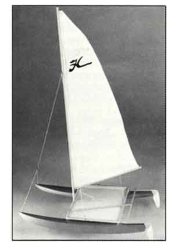 14-inch wooden model of Hobie Cat 14 sailboat with nylon sails, perfect for display or hands-on crafting.