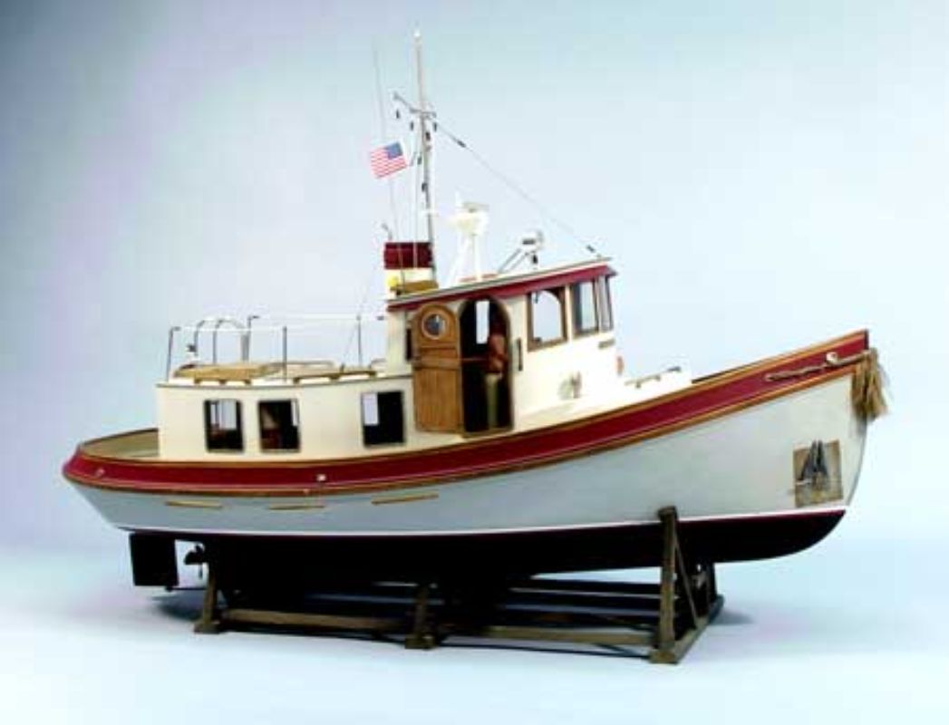 28-inch wooden Victory Tugboat model kit, showcasing detailed craftsmanship for hobbyists and nautical enthusiasts.