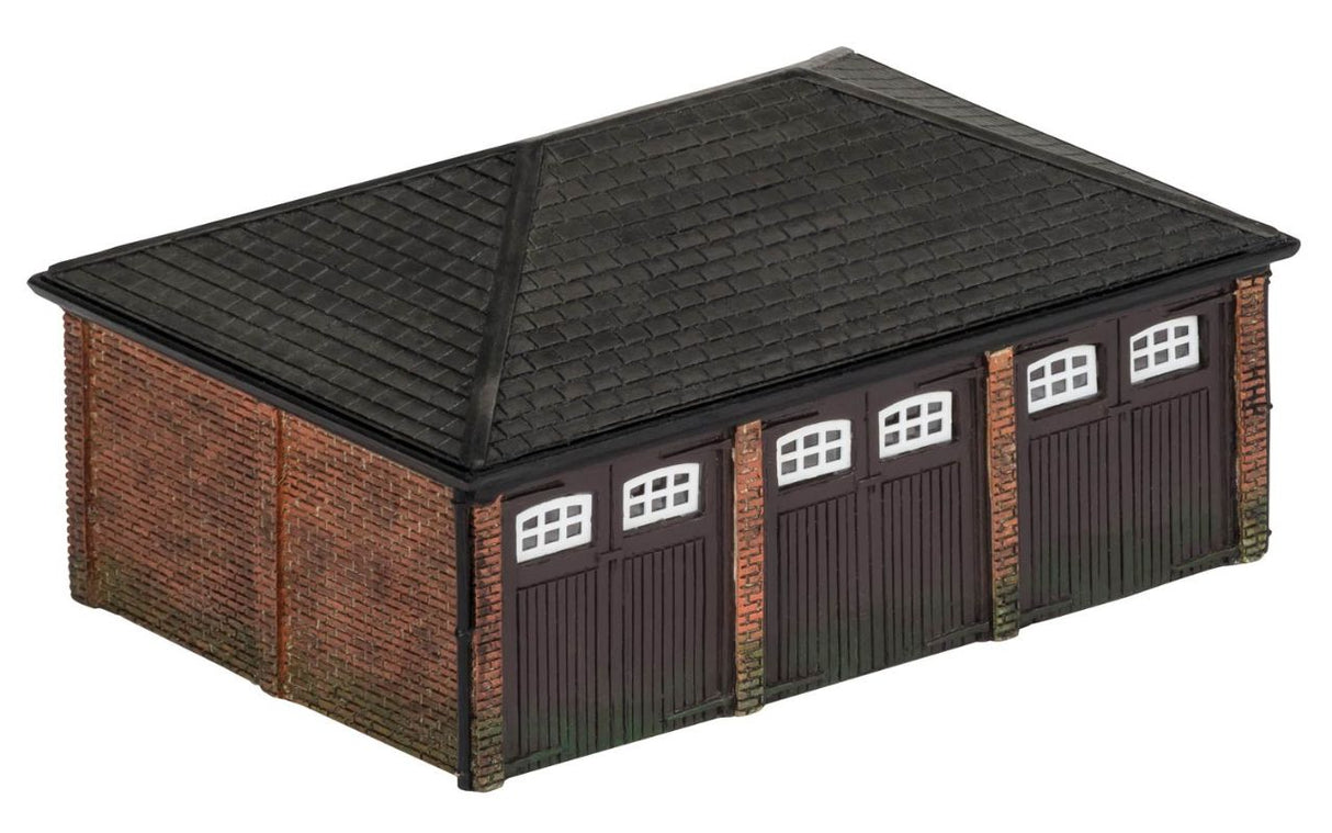 Hornby Triple Garage model adds realism with detailed features for OO gauge model railways. Perfect for collectors and hobbyists.