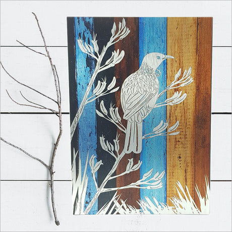 Large wall art featuring a detailed Tui bird on aged timber, perfect for nature-inspired home decor.