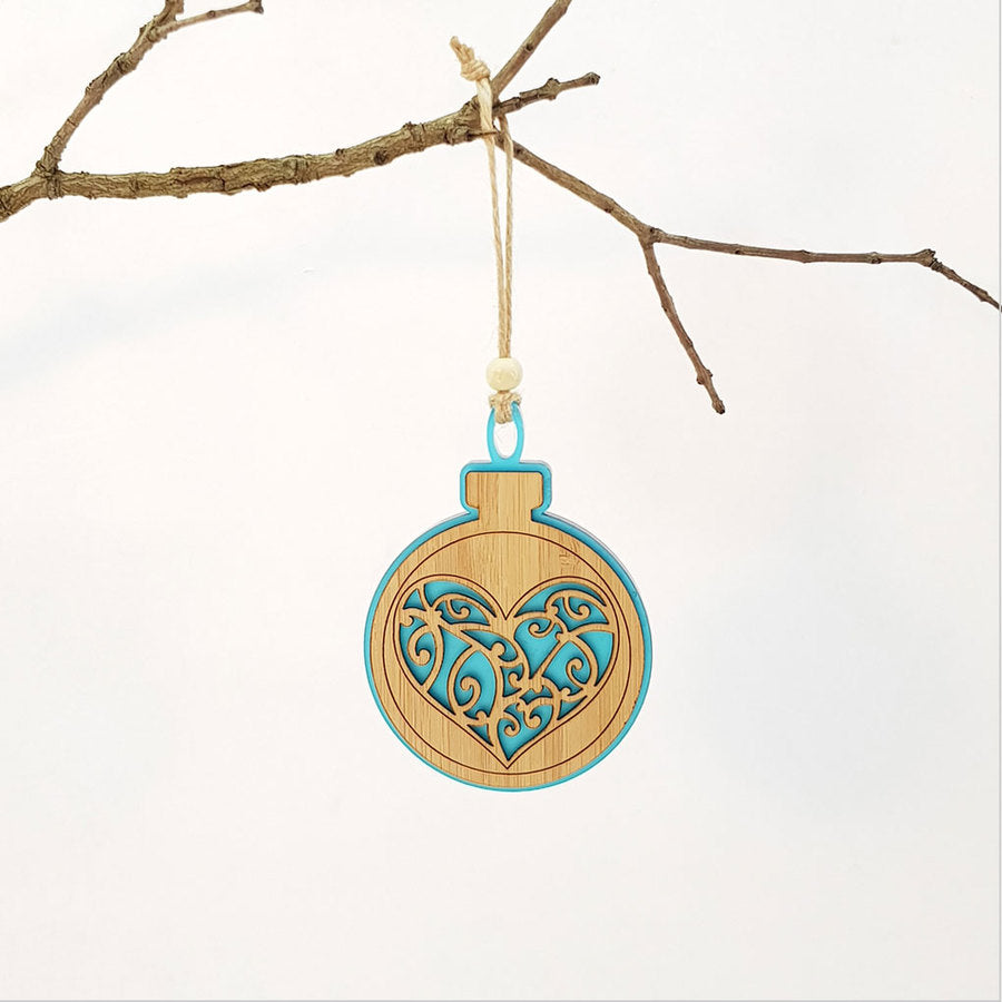 Teal satin acrylic heart-shaped hanging ornament with bamboo detailing, perfect for holiday decor and gifting.