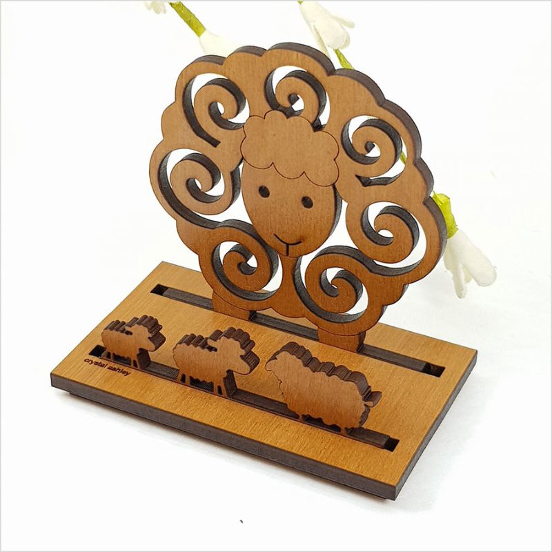 Rimu Sheep Card Holder (9cm) in laser-cut veneer, featuring a whimsical sheep design for stylish card organization.