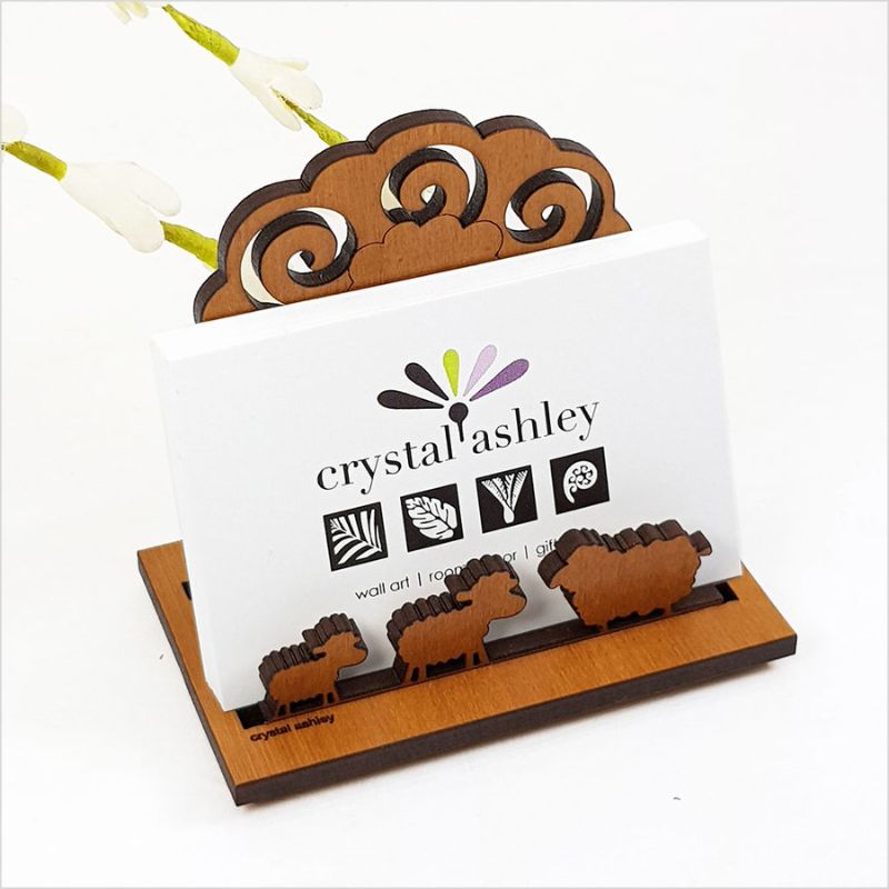 Rimu Sheep Card Holder (9cm) in laser-cut New Zealand veneer, featuring a whimsical sheep design for stylish organization.
