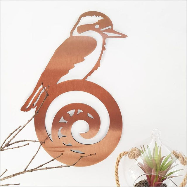 Brushed copper wall art featuring a kingfisher on a koru, perfect for indoor or outdoor decor, 270mm x 385mm.