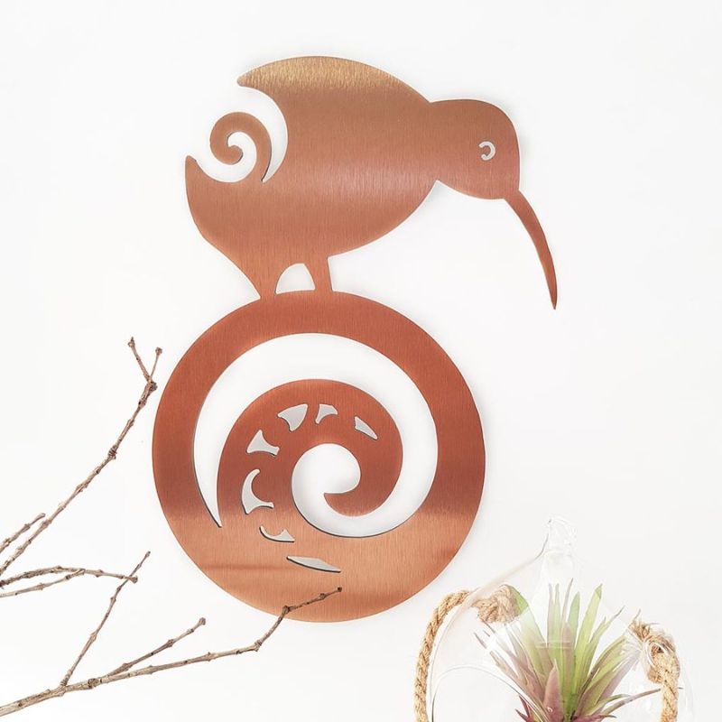 Brushed copper wall art featuring a kiwi bird and Koru design, symbolizing New Zealand’s wildlife and elegance. 38cm size.