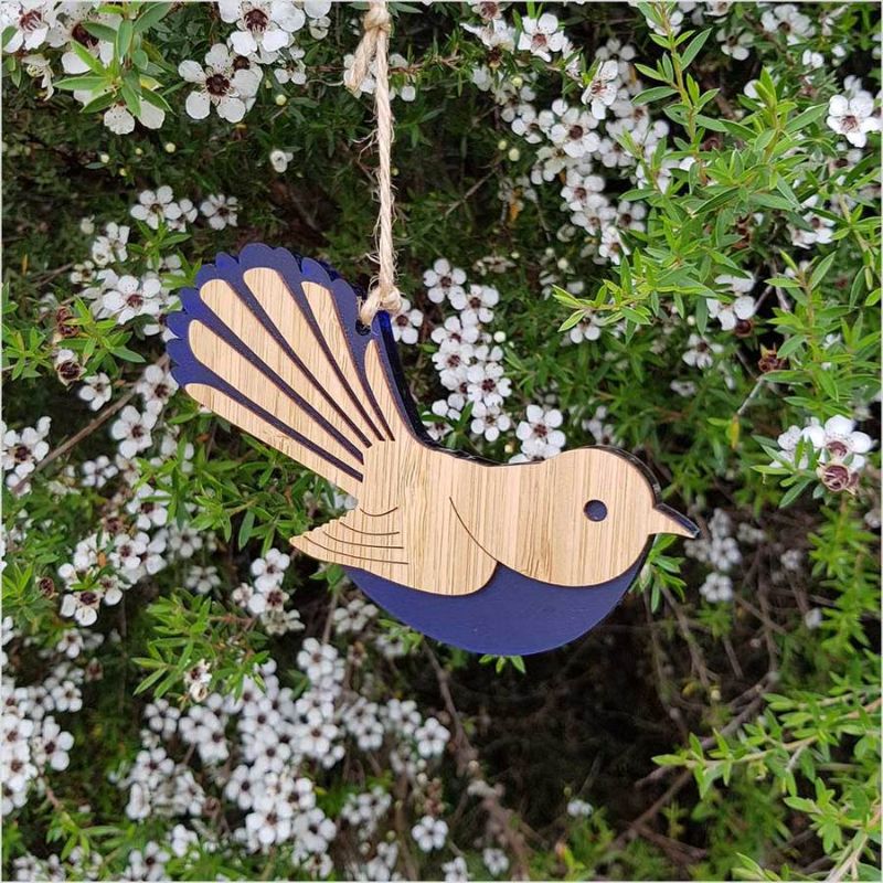Elegant Hanging Ornament featuring a fantail design in sustainable bamboo and vibrant blue satin acrylic, measuring 126mm x 90mm.