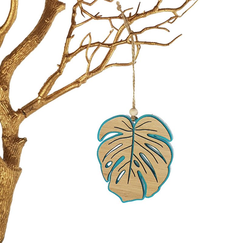 Teal satin acrylic Monstera hanging ornament, featuring intricate laser-cut bamboo design, perfect for vibrant home decor.