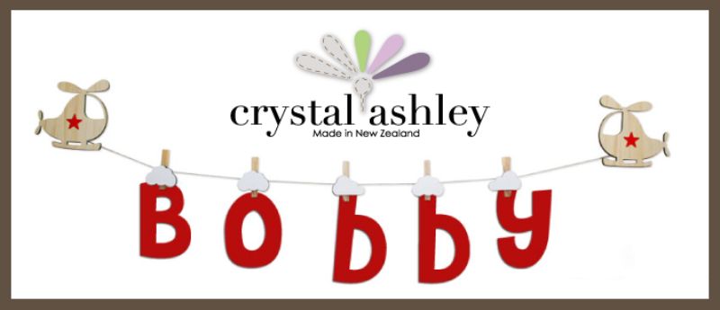 Helicopter-shaped pegs for displaying children's artwork, photos, and names in a fun and decorative way.