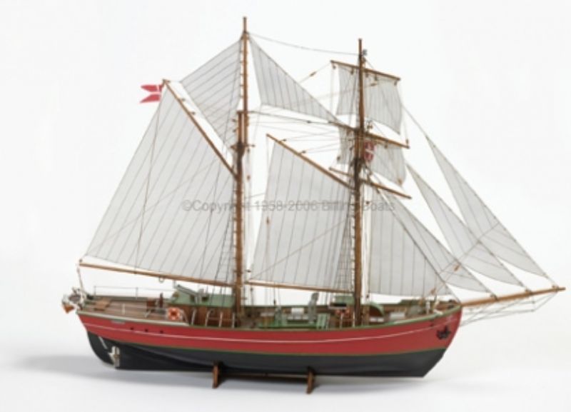 Detailed wooden model kit of the Lilla Dan, a historical ship, crafted from oak and beech for experienced hobbyists.