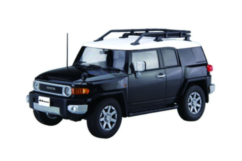 Fujimi 1/24 scale black Toyota FJ Cruiser plastic kitset for model building, requires glue and paint for assembly.