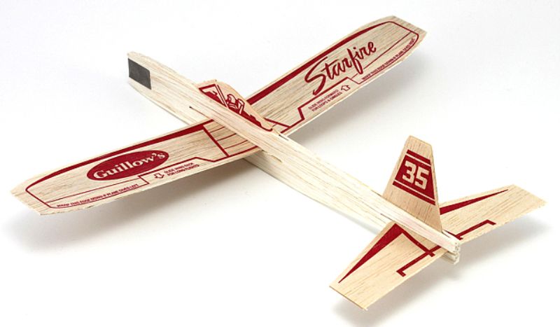 Starfire Glider model kit by Guillows featuring unassembled balsa wood for customizable assembly and excellent flight performance.