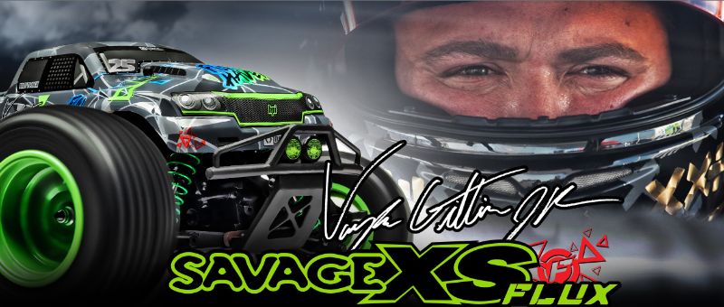 1/10 Savage XS Flux VG Jnr radio control truck with custom geometric livery, powerful brushless motor, and 4WD system.