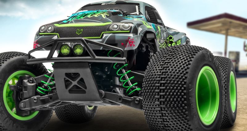 1/10 Savage XS Flux VG Jnr off-road truck in striking geometric livery, featuring brushless motor and 4WD for high-speed adventures.