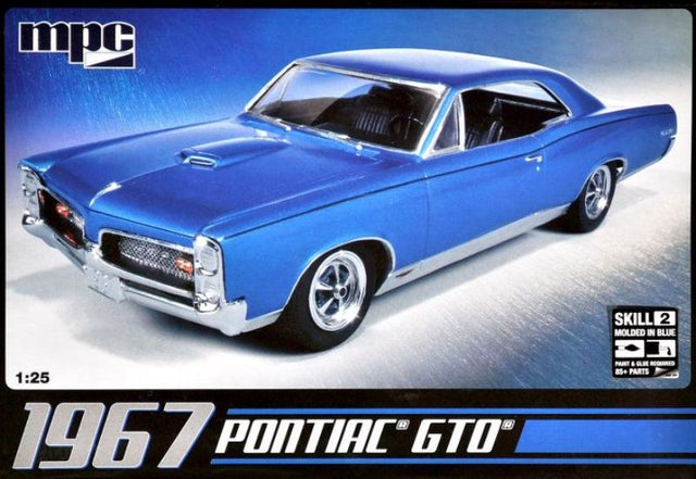 Unassembled 1/25 scale plastic model kit of 1967 Pontiac GTO, ideal for car enthusiasts and hobbyists.