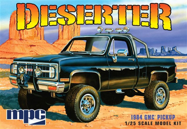 1/25 scale model kit of the 1984 GMC Pickup in black, unassembled, ideal for collectors and hobbyists, requires glue and paint.