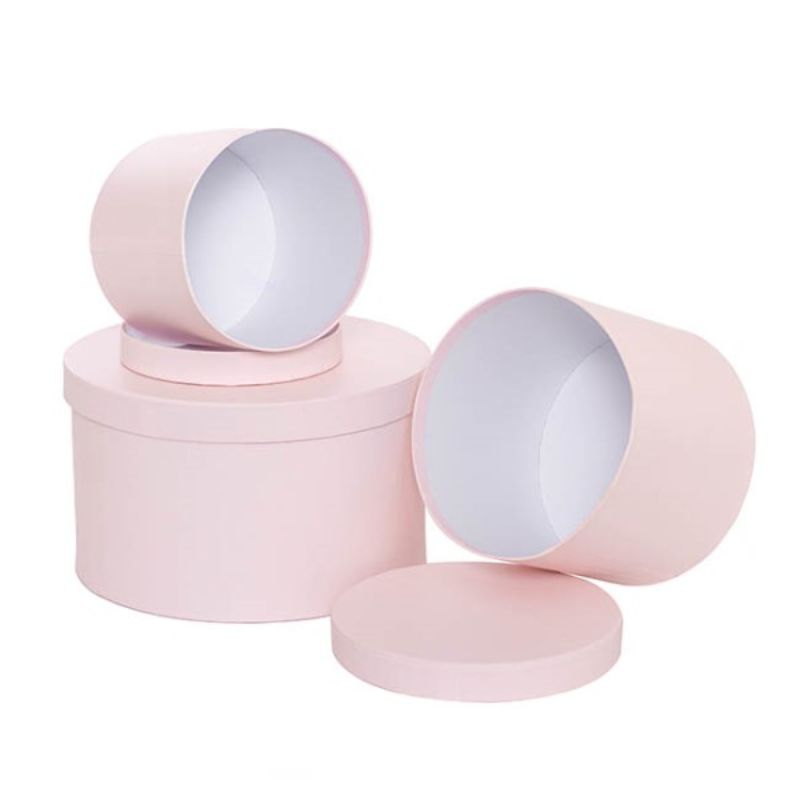 Set of 3 round baby pink gift boxes in varying sizes, perfect for birthdays and baby showers, eco-friendly and reusable.