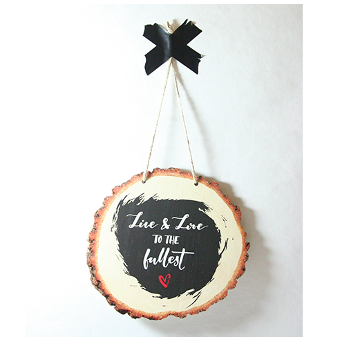 Rustic wood slice wall art with 'Love to the Fullest' message, crafted from eco-friendly pine veneer, ready to hang.