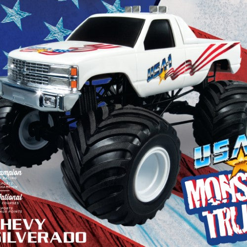 1/32 USA-1 Monster Truck kit with snap-together design, featuring no glue, vibrant decals, and huge vinyl tires.