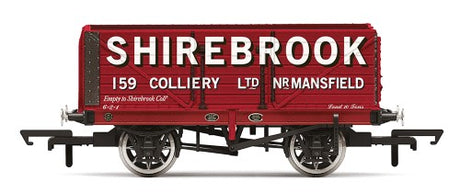 Detailed Hornby 7 Plank Wagon, Shirebrook Era 3, featuring drop sides for transporting goods in model railways.