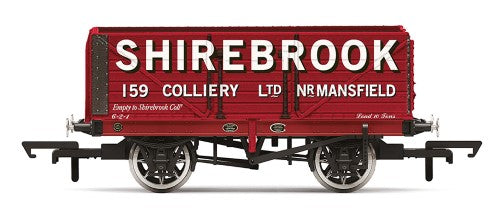 Detailed Hornby 7 Plank Wagon, Shirebrook Era 3, featuring drop sides for transporting goods in model railways.
