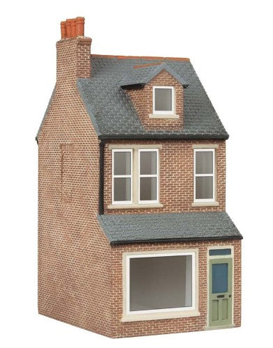 Hornby Parkers Newsagents 00 scale model, featuring vibrant signage and charming facade for railway dioramas.