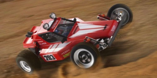 1/10 Tomahawk Retro R/C buggy features a durable chassis, adjustable shocks, and high-grip tires for superior performance.