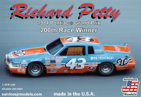 1/24 scale model kit of Richard Petty's 1984 Pontiac Grand Prix, perfect for collectors and NASCAR fans. Limited to 500 pieces.