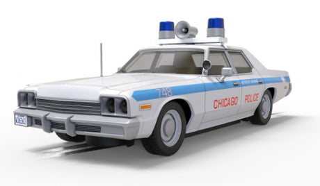 Blues Brothers Dodge Monaco slot car in blue and white, detailed replica of the iconic police vehicle from the movie.