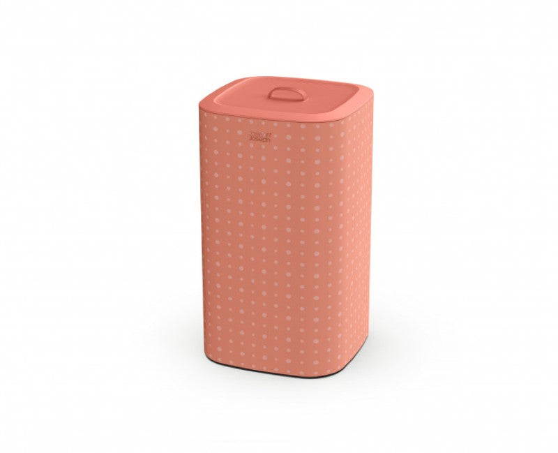 Joseph Joseph Tota Pop 60L laundry basket in coral features tri-bag system for easy sorting and stylish organization.