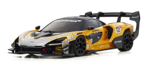 Kyosho MR-03W-MM body shell in orange, embodying the sleek design of the McLaren Senna for enhanced RC racing performance.