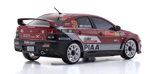 Kyosho MA-020 Lancer Evo X radio-controlled car, featuring AWD, VCS suspension, and drift tires for dynamic racing fun.