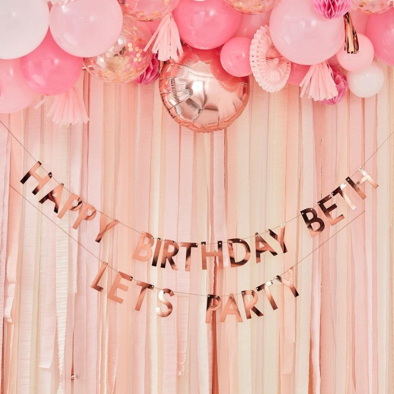 Rose gold personalised birthday banner, 4m long with 84 letters, perfect for custom celebrations and elegant decor.