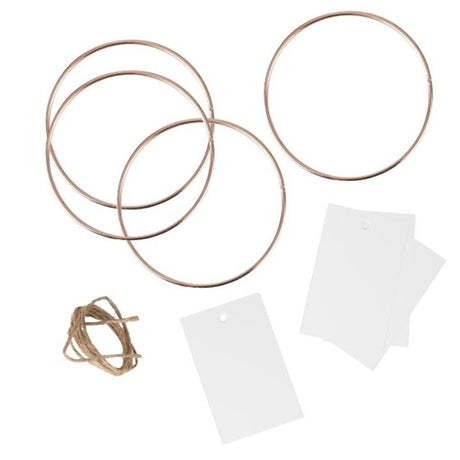 Elegant rose gold metal hoops for place cards, perfect for weddings and special events. Pack includes 4 hoops and twine.