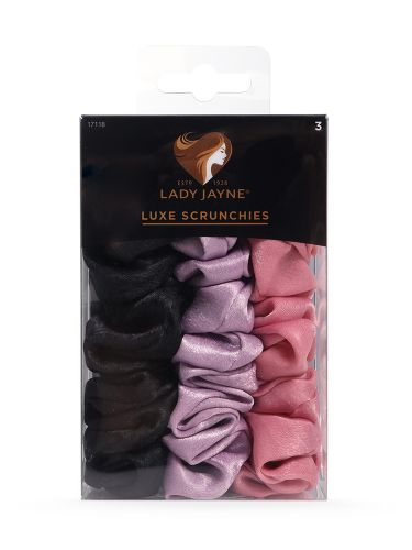 Set of three large Luxe Scrunchies in black, purple, and pink, made from soft-touch fabric for gentle, kink-free hold.