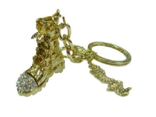 Gold sequin-embellished boot keyring, stylish and functional, perfect for enhancing your accessories.