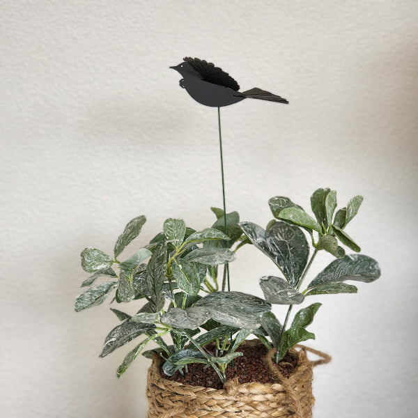 Mini Tui Plant Stake, a 40cm whimsical garden accent with 3D wings, perfect for indoor and outdoor plants.